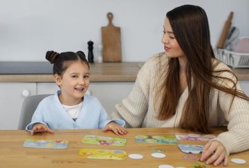 medium-shot-mother-girl-playing-game