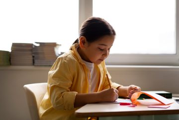 side-view-kid-cheating-school_2